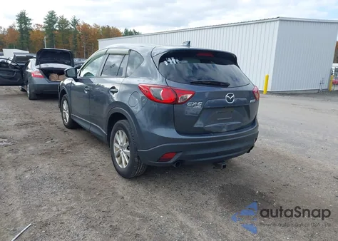 2013 Mazda Cx-5 Touring z USA, uszkodzony, nr VIN JM3KE4CE9D0130476